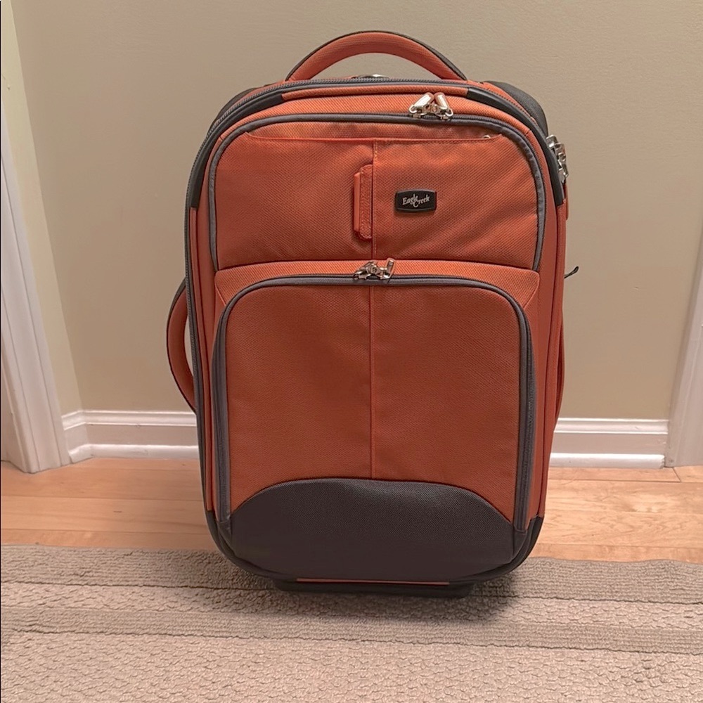 Orange and charcoal carry-on